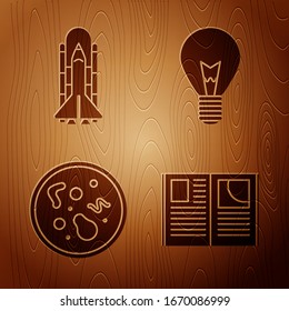 Set Open book, Space shuttle and rockets, Bacteria and Light bulb with concept of idea on wooden background. Vector