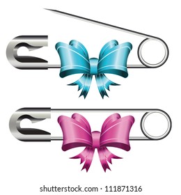 Set of opened and closed safety pins with colorful bows