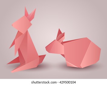 Set of origami paper rabbits separately from the background. Vector element for your design