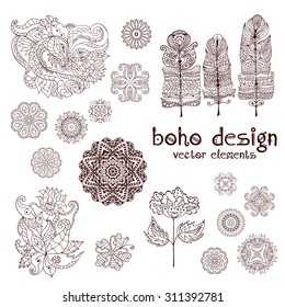 Set of ornamental boho style elements: feathers, mandalas, paisley, flowers, leaves. Henna tattoo doodle vector elements. Hand drawn mehndi design symbols. Orient traditional background.