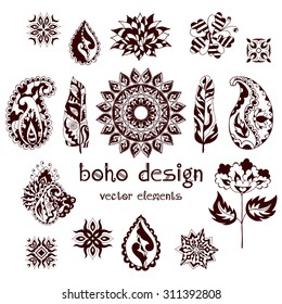 Set of ornamental boho style elements: feathers, mandalas, paisley, lotus, flowers, leaves. Henna tattoo doodle vector elements. Hand drawn mehndi design symbols. Orient traditional background.