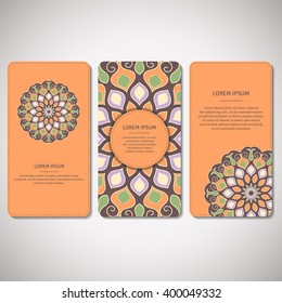 Set of ornamental cards, flyers with flower mandala in orange, , brown, green colors. Vintage decorative elements. Indian, asian, arabic, islamic, ottoman motif. Vector illustration.