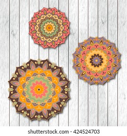 Set of ornamental colorful floral mandalas. Stylish geometric pattern in oriental style. Indian, asian, arabic, islamic, ottoman, moroccan motif. Vector illustration.