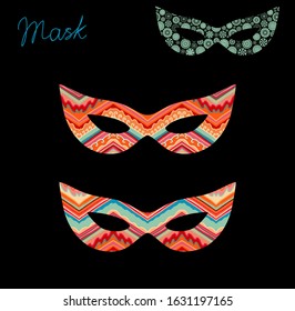 Set of ornamental masks on dark background