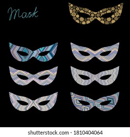 Set of ornamental masks on dark background