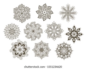 Set of Ornamental vector rosettes, mandala, snowflakes on white background
