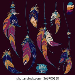 
Set of ornaments, feathers and beads. Native american indian dream catcher, traditional symbol. Feathers and beads on dark background. Vector decorative elements hippie.