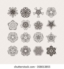 Set of ornate vector mandala symbols. Gothic lace tattoo. Celtic weave with sharp corners. The circular pattern.