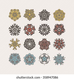 Set of ornate vector mandala symbols. Gothic lace tattoo. Celtic weave with sharp corners. The circular pattern.