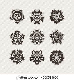 Set of ornate vector mandala symbols. Gothic lace tattoo. Celtic weave with sharp corners. The circular pattern.