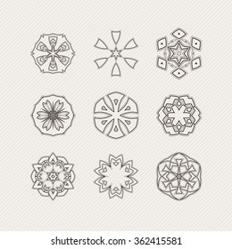 Set of ornate vector mandala symbols. Gothic lace tattoo. Celtic weave with sharp corners. The circular pattern.