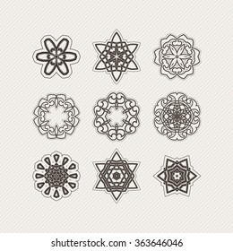 Set of ornate vector mandala symbols. Gothic lace tattoo. Celtic weave with sharp corners. The circular pattern.