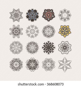 Set of ornate vector mandala symbols. Gothic lace tattoo. Celtic weave with sharp corners. The circular pattern.