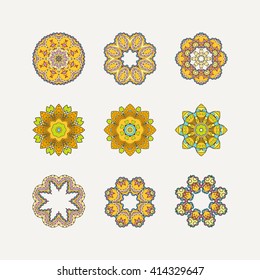 Set of ornate vector mandala symbols. Mehndi lace tattoo. Oriental weave with sharp corners. The circular pattern.