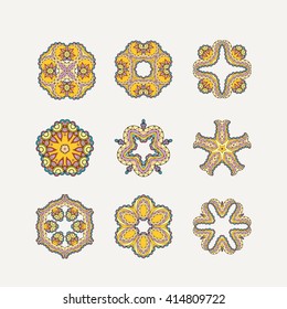Set of ornate vector mandala symbols. Mehndi lace tattoo. Oriental weave with sharp corners. The circular pattern.