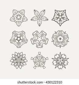 Set of ornate vector mandala symbols. Mehndi lace tattoo. Oriental weave. The circular pattern.