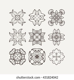 Set of ornate vector mandala symbols. Mehndi lace tattoo. Oriental weave. The circular pattern.