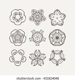 Set of ornate vector mandala symbols. Mehndi lace tattoo. Oriental weave. The circular pattern.