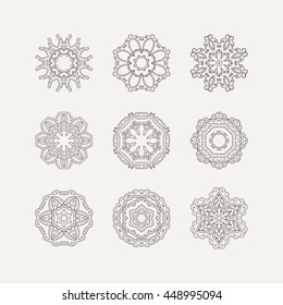 Set of ornate vector mandala symbols. Mehndi lace tattoo. Oriental weave. The circular pattern.