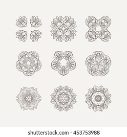 Set of ornate vector mandala symbols. Mehndi lace tattoo. Oriental weave. The circular pattern.