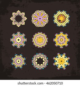 Set of ornate vector mandala symbols. Mehndi lace tattoo. Oriental weave. The circular pattern.