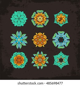 Set of ornate vector mandala symbols. Mehndi lace tattoo. Oriental weave. The circular pattern.
