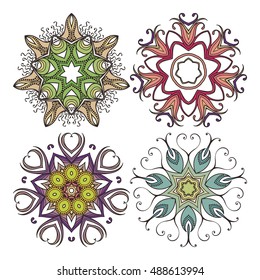 Set of ornate vector mandala symbols. Mehndi lace tattoo. Art Nouveau weave. The circular pattern.