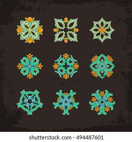 Set of ornate vector mandala symbols. Mehndi lace tattoo. Oriental weave. The circular pattern.