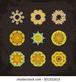 Set of ornate vector mandala symbols. Mehndi lace tattoo. Oriental weave. The circular pattern.