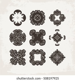 Set of ornate vector mandala symbols. Mehndi lace tattoo. Oriental weave. The circular pattern.