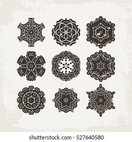 Set of ornate vector mandala symbols. Mehndi lace tattoo. Oriental weave. The circular pattern.