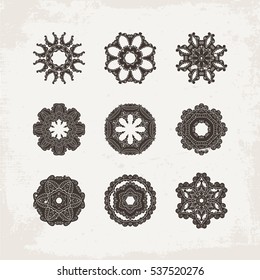 Set of ornate vector mandala symbols. Mehndi lace tattoo. Oriental weave. The circular pattern.
