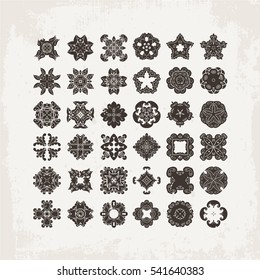 Set of ornate vector mandala symbols. Mehndi lace tattoo. Oriental weave. The circular pattern.