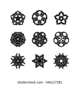 Set of ornate vector mandala symbols. Mehndi lace tattoo. Oriental weave. The circular pattern.