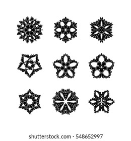 Set of ornate vector mandala symbols. Mehndi lace tattoo. Oriental weave. The circular pattern.