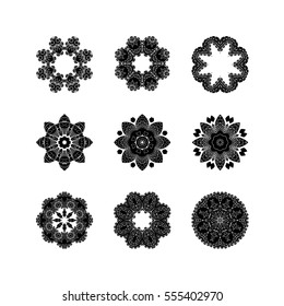 Set of ornate vector mandala symbols. Mehndi lace tattoo. Oriental weave. The circular pattern.