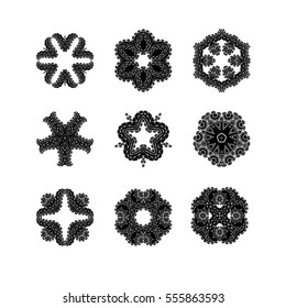 Set of ornate vector mandala symbols. Mehndi lace tattoo. Oriental weave. The circular pattern.