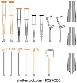 Set of orthopedic equipment (crutches, walking sticks) on white background.