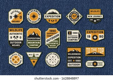 Set of outdoor emblems on blue jeans background. 