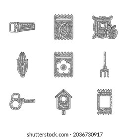 Set Pack full of seeds of plant, Bird house, Fertilizer bag, Garden rake, Leaf garden blower, Corn, Apple in the sack and Hand saw icon. Vector