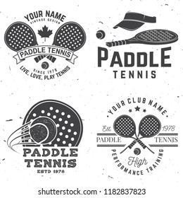 Set of Paddle tennis badge, emblem or sign. Vector illustration. Concept for shirt, print, stamp or tee. Vintage typography design with paddle tennis racket, visor and paddle ball silhouette.