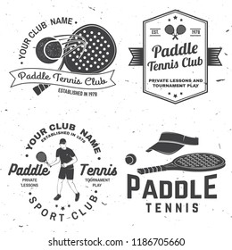 Set of Paddle tennis badge, emblem or sign. Vector illustration. Concept for shirt, print, stamp or tee. Vintage typography design with paddle tennis racket, visor and paddle ball silhouette.