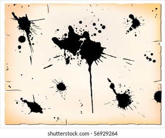 Set of paint splats on old paper sheet