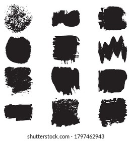 A set of paint strokes with a dry brush. Grunge spots black on white background. Black artistic paint, hand drawn. Dry Brush Stroke elements collection