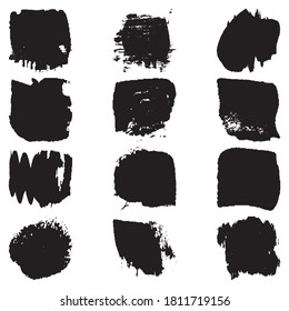 A set of paint strokes with a dry brush. Grunge spots black on white background. Black artistic paint, hand drawn. Dry Brush Stroke elements collection