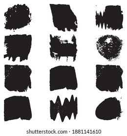 A set of paint strokes with a dry brush. Grunge spots black on white background. Black artistic paint, hand drawn. Dry Brush Stroke elements collection
