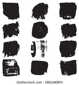 Un conjunto de pinceladas con un cepillo seco. Manchas gruesas negras sobre fondo blanco. Pintura artística negra, dibujada a mano. Colección de elementos de pincel seco