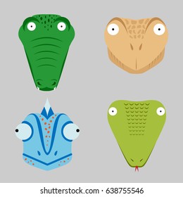 Set of painted reptilian heads