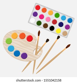 Set of paints, palette and brushes. Isolated on white background.