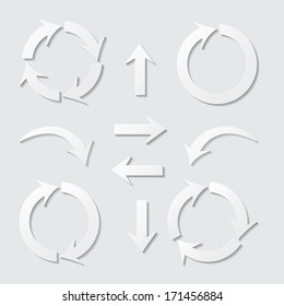 set of paper arrows with shadows on gray background